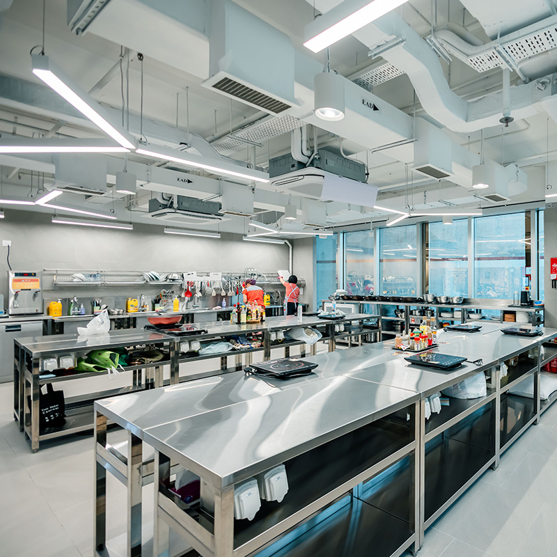 Community Kitchen: Designed to accommodate up to eight families at a time, the kitchen is equipped with ovens, air fryers, stand mixers and a wide range of cooking appliances